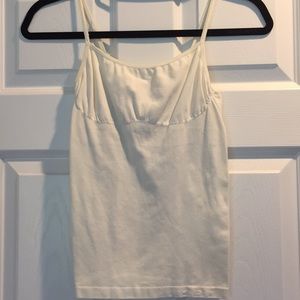 Bebe white cami stretchy with build in bra
